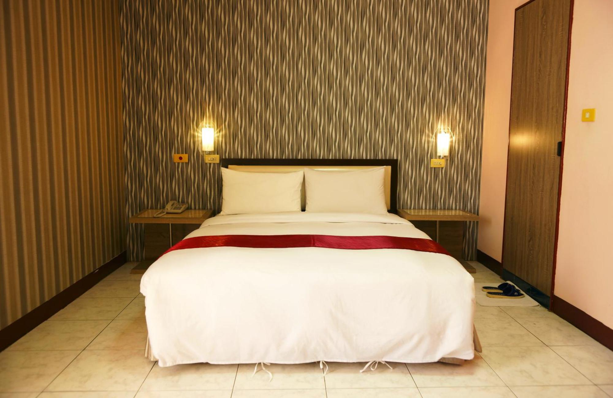 Jiuning Business Hotel Tainan Quarto foto